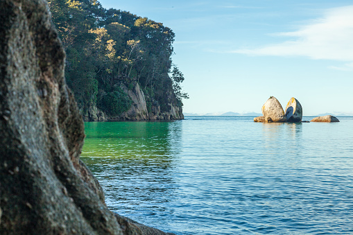 Split Apple rock featuring on our top ten New Zealand selfie spots.